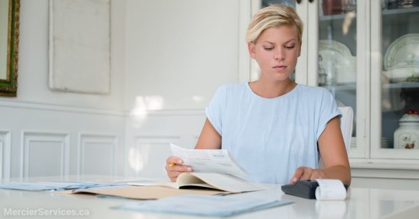 woman working on tax return